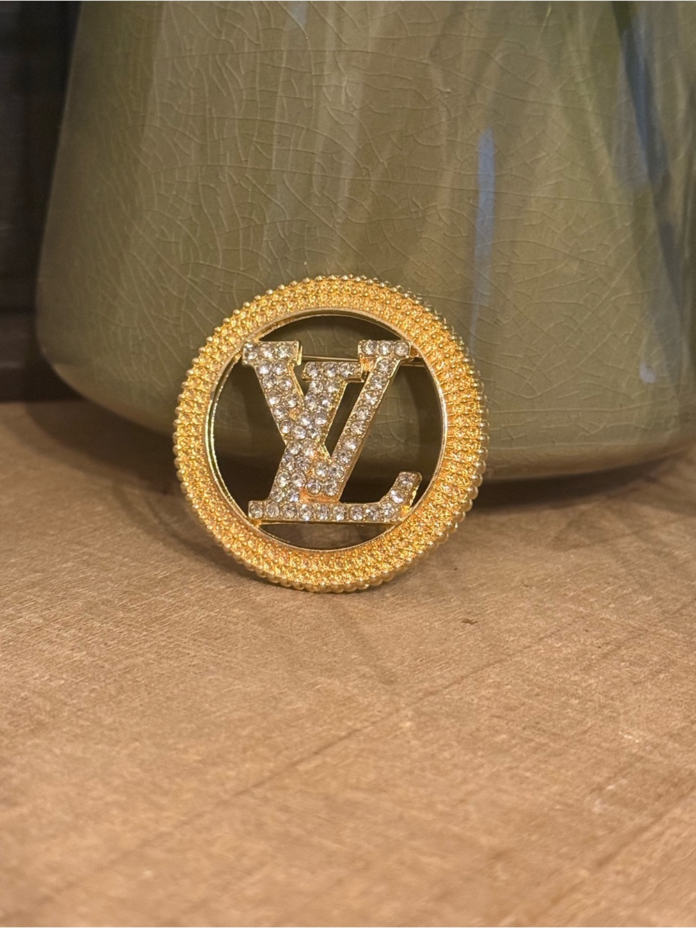 Gold Tone Crystal LV Monogram Brooch